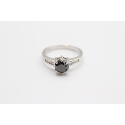 96 - 9ct White Gold Black Gemstone Single Stone Ring With Diamond Set Shank (3.3g)