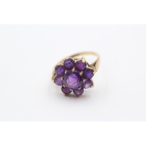 129 - 9ct Gold Amethyst Floral Cluster Ring (4.2g) Size  M 1/2