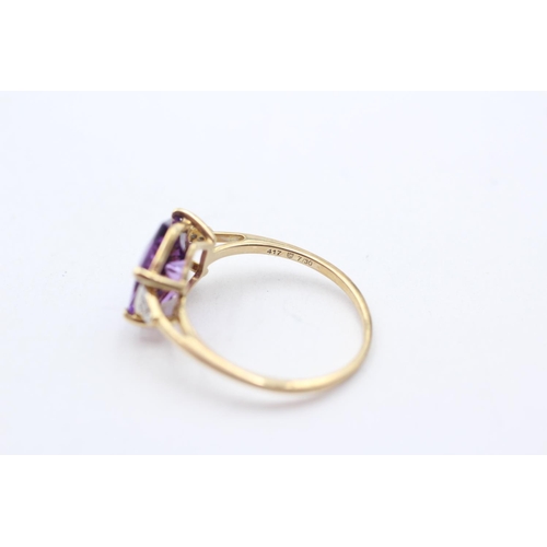 156 - 9ct Gold Fancy Cut Amethyst Single Stone Ring With Diamond Sides (2.2g) Size  P