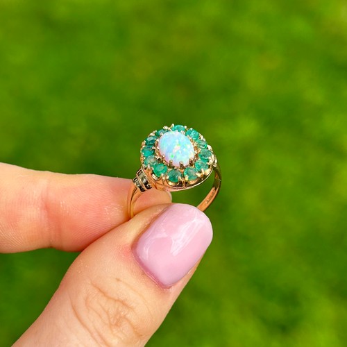 47 - 9ct Gold Emerald & White Opal Oval Halo Ring (2.7g) Size  O 1/2