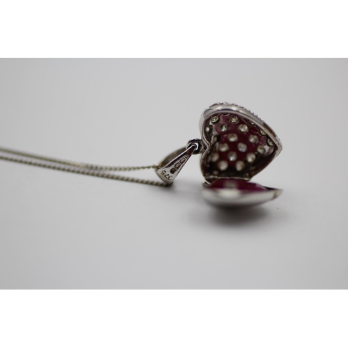 63 - 9ct White Gold Diamond & Ruby Heart Locket Necklace (3.4g)