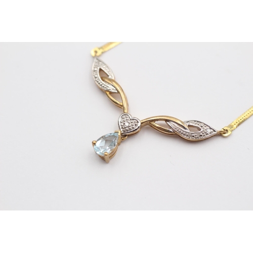 67 - 9ct Gold Blue Topaz & Diamond Heart Static Pendant Necklace (3.8g)