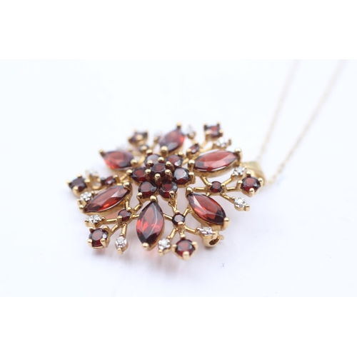 81 - 9ct Gold Diamond & Garnet Floral Cluster Pendant Necklace/Brooch (5.4g)