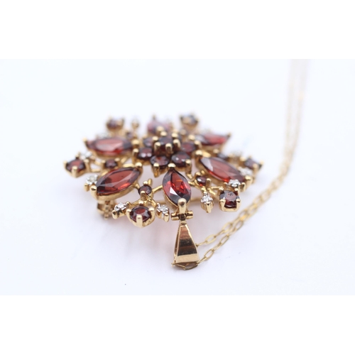 81 - 9ct Gold Diamond & Garnet Floral Cluster Pendant Necklace/Brooch (5.4g)