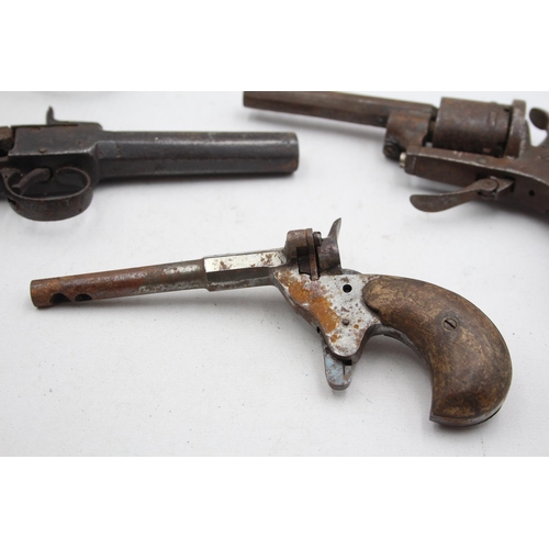 287 - 4 x Antique / Vintage Pistols