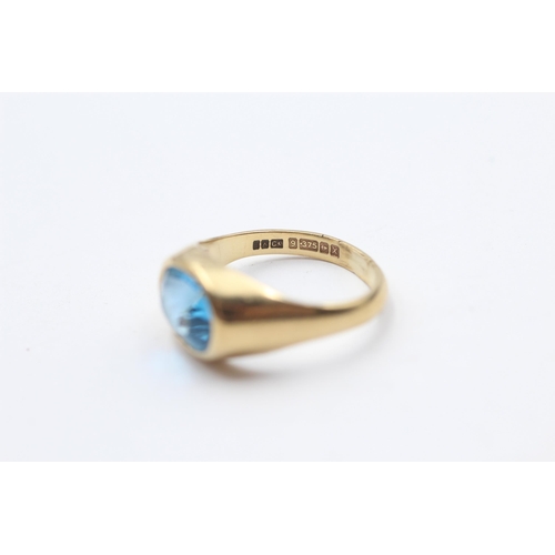 112 - 9ct Gold Blue Topaz Single Stone Ring (3.5g) Size  N