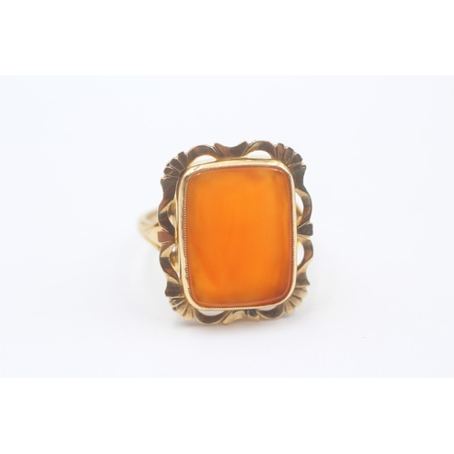 119 - 9ct Gold Carnelian Single Stone Cocktail Ring With Etched Openwork Frame (5.6g)