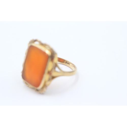 119 - 9ct Gold Carnelian Single Stone Cocktail Ring With Etched Openwork Frame (5.6g)