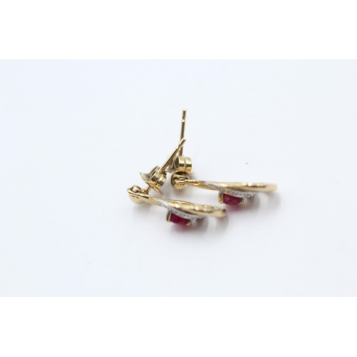 129 - 2 X 9ct Gold Diamond & Ruby Earrings (2g)