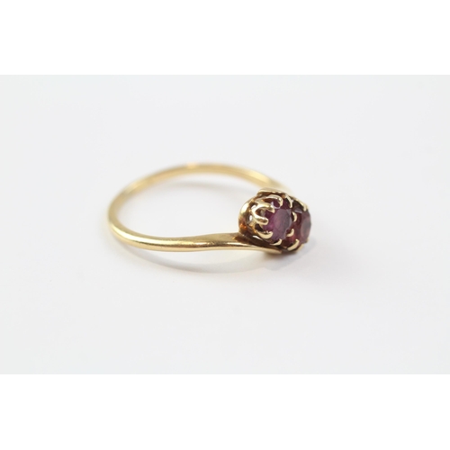 35 - 18ct Gold Garnet Two Stone Bypass Ring (2.8g) Size  M 1/2