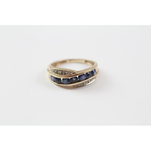 81 - 9ct Gold Diamond & Sapphire Crossover Ring (2.2g) Size  K