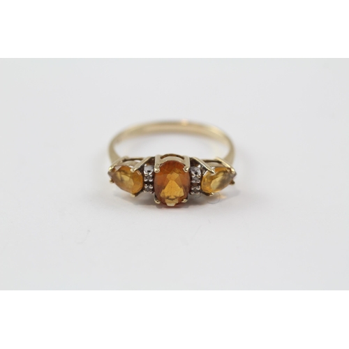 87 - 9ct Gold Citrine Three Stone Ring With Diamond Spacers (2g) Size  N 1/2