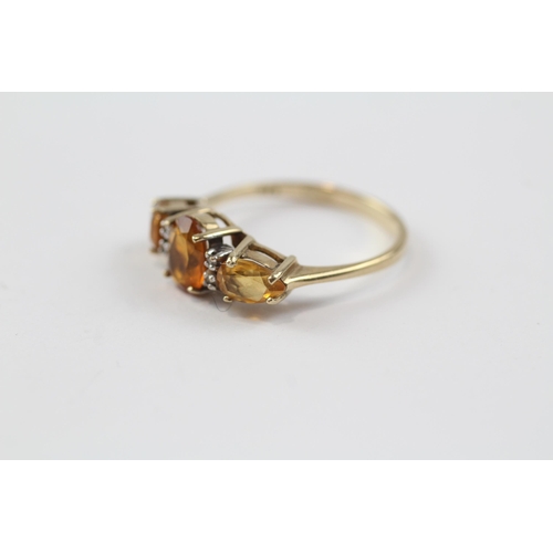 87 - 9ct Gold Citrine Three Stone Ring With Diamond Spacers (2g) Size  N 1/2