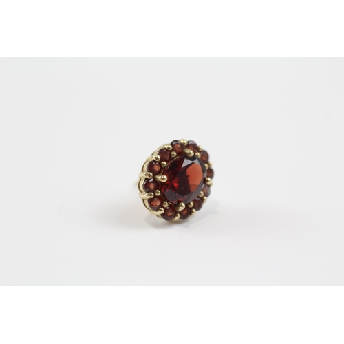 94 - 9ct Gold Garnet Oval Halo Stud Earrings (4.6g)