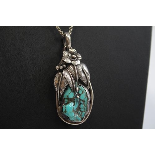 168 - A Silver Turquoise Set Pendant Necklace