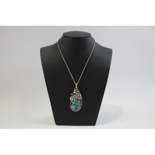 168 - A Silver Turquoise Set Pendant Necklace