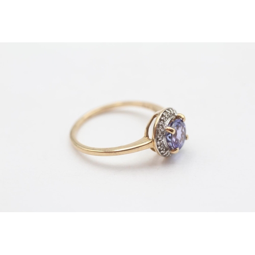 101 - 9ct Gold Diamond Accented Tanzanite Set Halo Ring (1.9g) Size  L 1/2