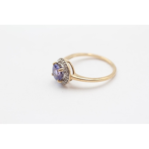 101 - 9ct Gold Diamond Accented Tanzanite Set Halo Ring (1.9g) Size  L 1/2