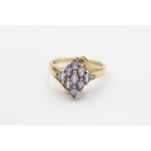 104 - 9ct Gold Diamond Accented Tanzanite Set Marquise Shaped Ring (2.4g) Size  L