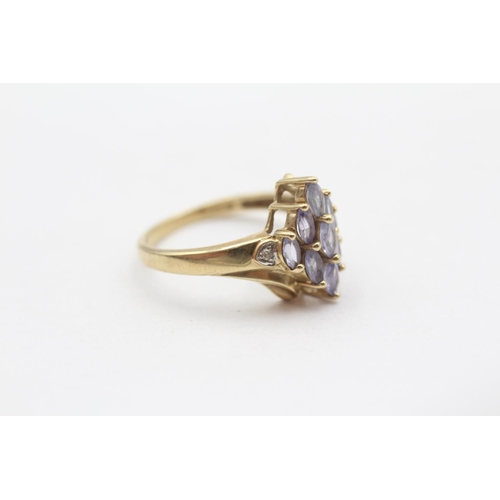 104 - 9ct Gold Diamond Accented Tanzanite Set Marquise Shaped Ring (2.4g) Size  L