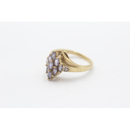 104 - 9ct Gold Diamond Accented Tanzanite Set Marquise Shaped Ring (2.4g) Size  L