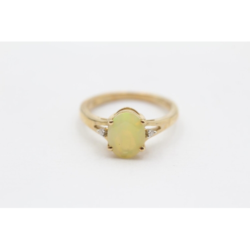 115 - 9ct Gold Opal And Diamond Set Dress Ring (2.1g) Size  L