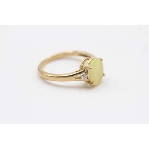 115 - 9ct Gold Opal And Diamond Set Dress Ring (2.1g) Size  L