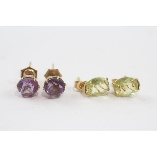 134 - 2 X 9ct Gold Paired Gemstone Earrings Inc. Peridot & Amethyst (2.9g)