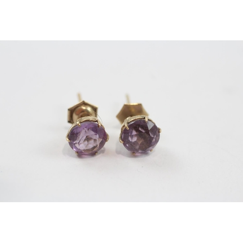 134 - 2 X 9ct Gold Paired Gemstone Earrings Inc. Peridot & Amethyst (2.9g)