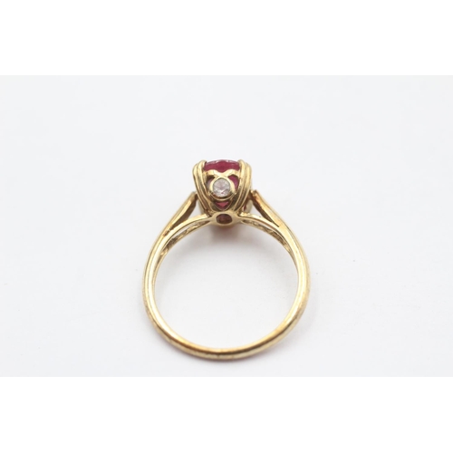 71 - 9ct Gold Glass Filled Ruby Set Solitaire Ring (2.6g) Size  N