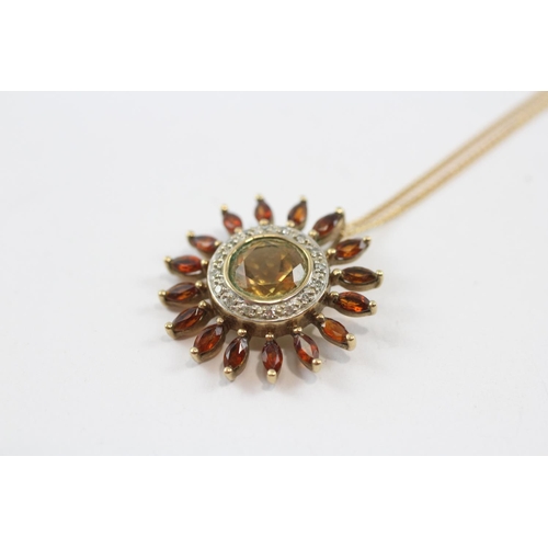 82 - 9ct Gold Garnet, Citrian And Diamond Set Sunflower Pendant Necklace (4.2g)