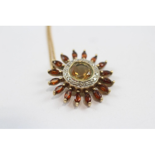 82 - 9ct Gold Garnet, Citrian And Diamond Set Sunflower Pendant Necklace (4.2g)