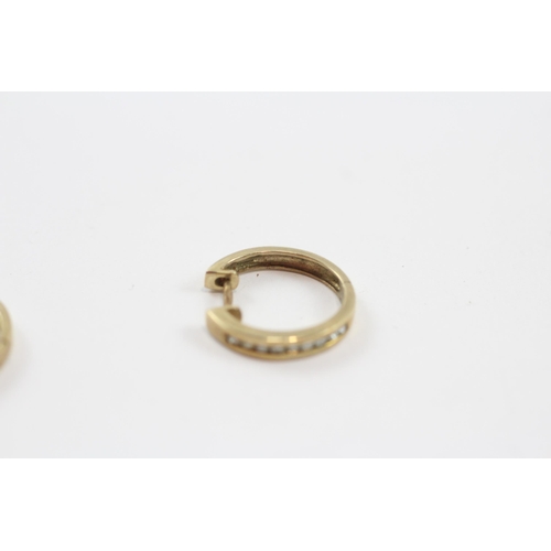 28 - 9ct Gold Snuggy Channel Set Diamond Hoop Earrings (2.6g)