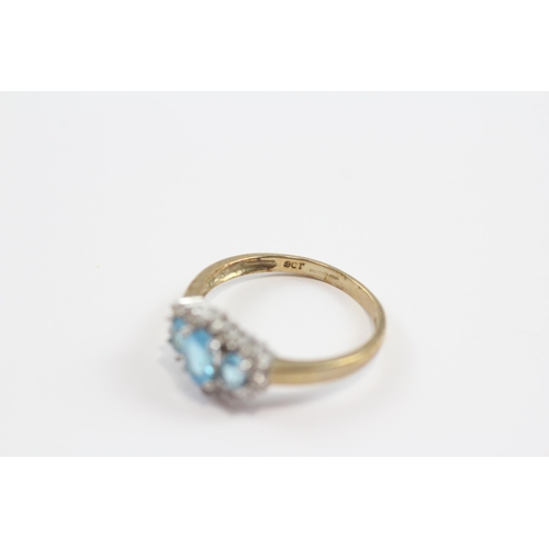 49 - 9ct Gold Blue Topaz & Diamond Three Stone Halo Dress Ring (2.3g) Size  P