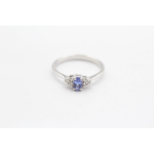 121 - 9ct White Gold Tanzanite & Diamond Seven Stone Cluster Dress Ring (2.2g) Size  N