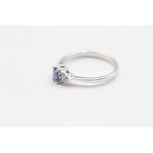 121 - 9ct White Gold Tanzanite & Diamond Seven Stone Cluster Dress Ring (2.2g) Size  N