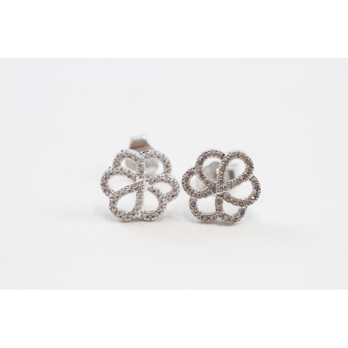 126 - 9ct White Gold Diamond Set Floral Stud Earrings (1.6g)