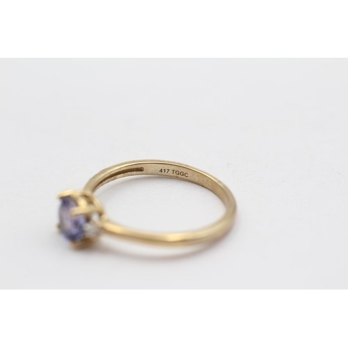 129 - 9ct Gold Tanzanite & Diamond Trilogy Dress Ring (2g) Size  P