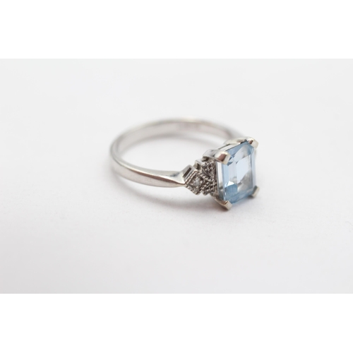 6 - 9ct White Gold Blue Topaz & Diamond Three Stone Dress Ring (2.5g) Size  L