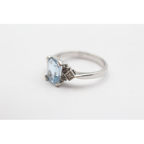 6 - 9ct White Gold Blue Topaz & Diamond Three Stone Dress Ring (2.5g) Size  L