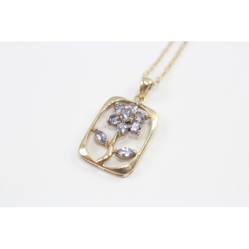 145 - 9ct Gold Tanzanite Framed Floral Pendant On Chain (2.3g)