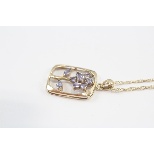 145 - 9ct Gold Tanzanite Framed Floral Pendant On Chain (2.3g)