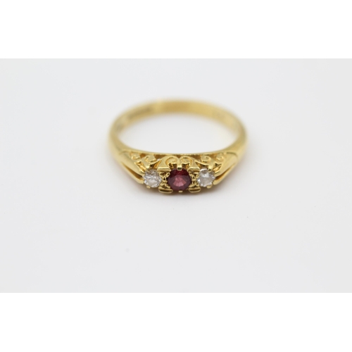 153 - 18ct Gold Diamond & Ruby Three Stone Ring (4.1g) Size  O