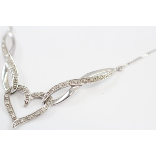 38 - 9ct White Gold Diamond Set Static Knot Pendant Necklace (2.9g)