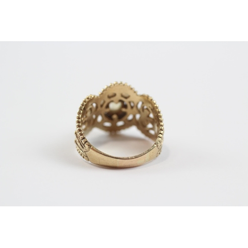 61 - 9ct Gold Moonstone Ornate Open Work Ring (3.5g) Size  K