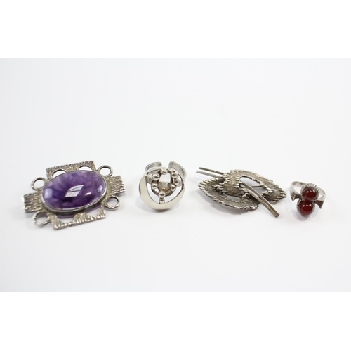 210 - A Collection Of Silver Brutalist Style Jewellery Including Amethyst