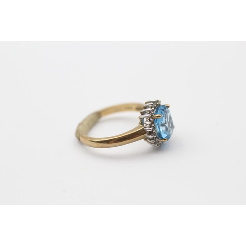 104 - 9ct Gold Diamond & Blue Topaz Oval Cluster Ring (3.4g) Size  O