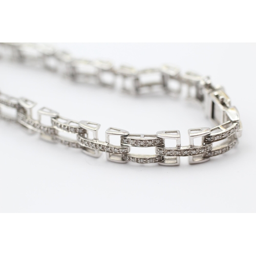 127 - 9ct White Gold Diamond Link Bracelet (14.1g)