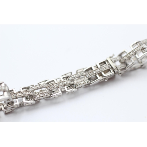 127 - 9ct White Gold Diamond Link Bracelet (14.1g)