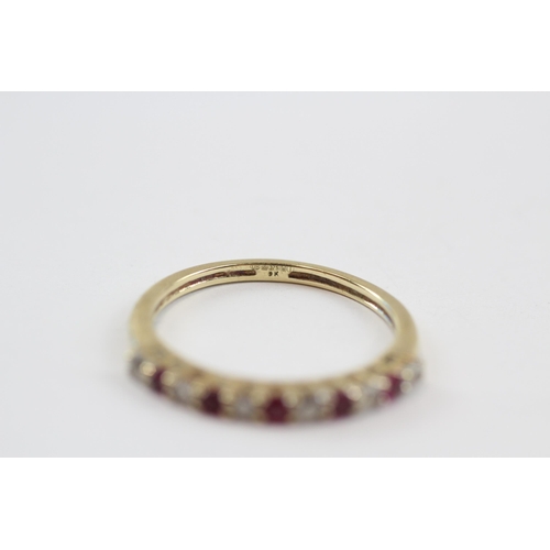 137 - 9ct Gold Diamond & Ruby Single Row Ring (1.8g) Size  Q